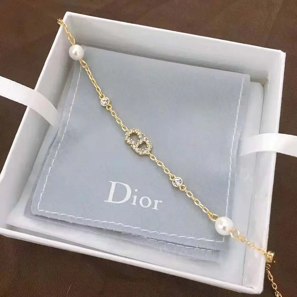 Dior Clair D Lune Bracelet Gold-Finish Metal with White Resin Pearls and White Crystals for Women Dior Clair D Lune Bracelet Gold-Finish Metal with White Resin Pearls and White Crystals for Women