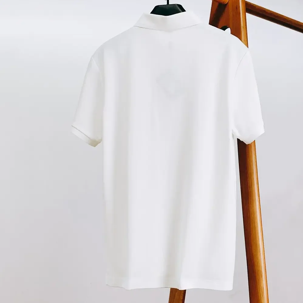 Prada Piqué Polo Shirt with Iconic Triangle Logo for Men Prada Piqué Polo Shirt with Iconic Triangle Logo for Men