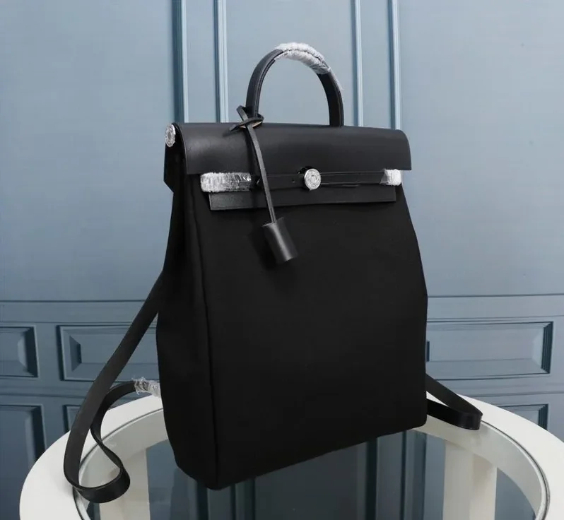 Hermes Buckle Lock Shape Striped Black, Silver Toned Hardware Bag