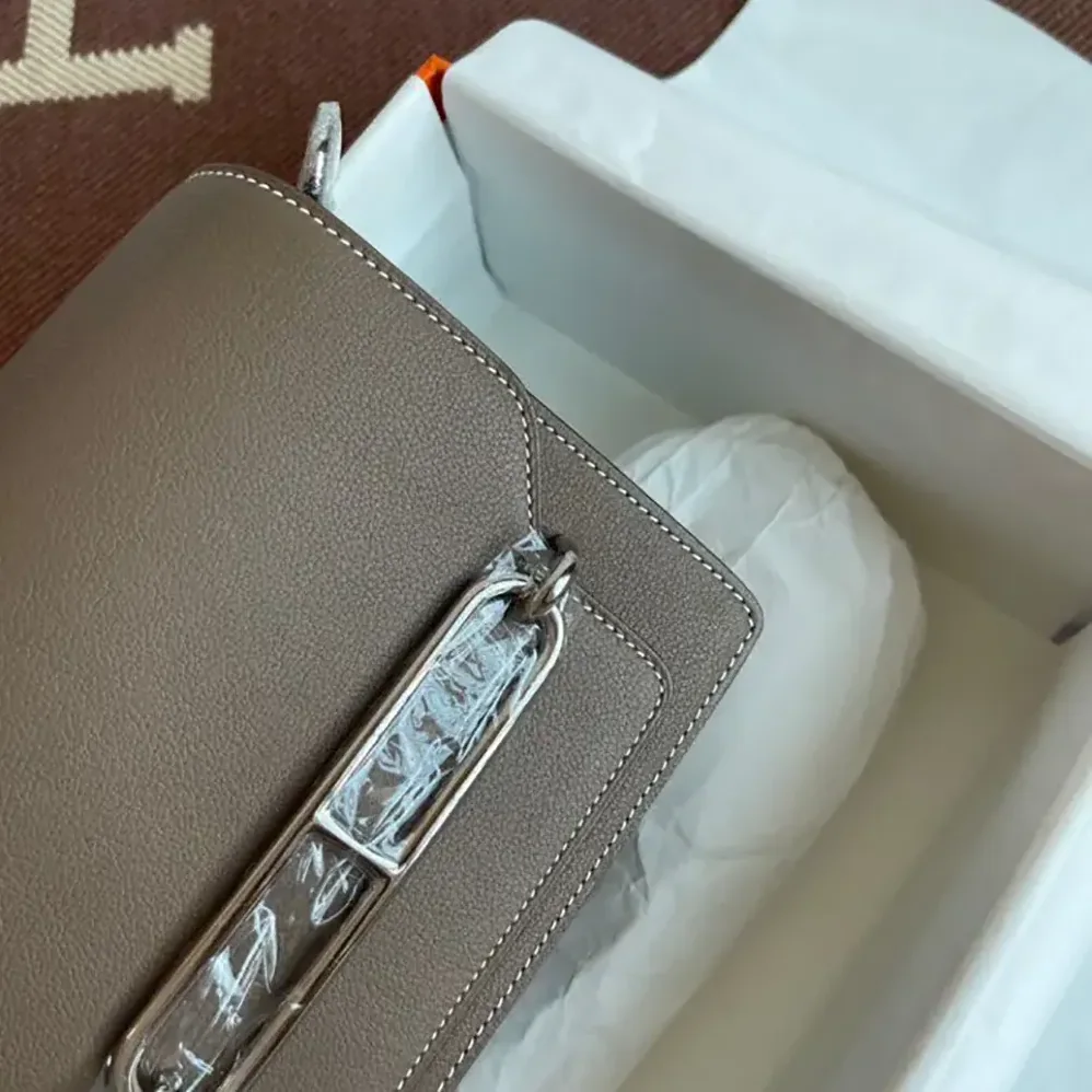 Hermes Roulis Mini Bag in Evercolor Calfskin for Women in Gray/Silver Hermes Roulis Mini Bag in Evercolor Calfskin for Women in Gray/Silver
