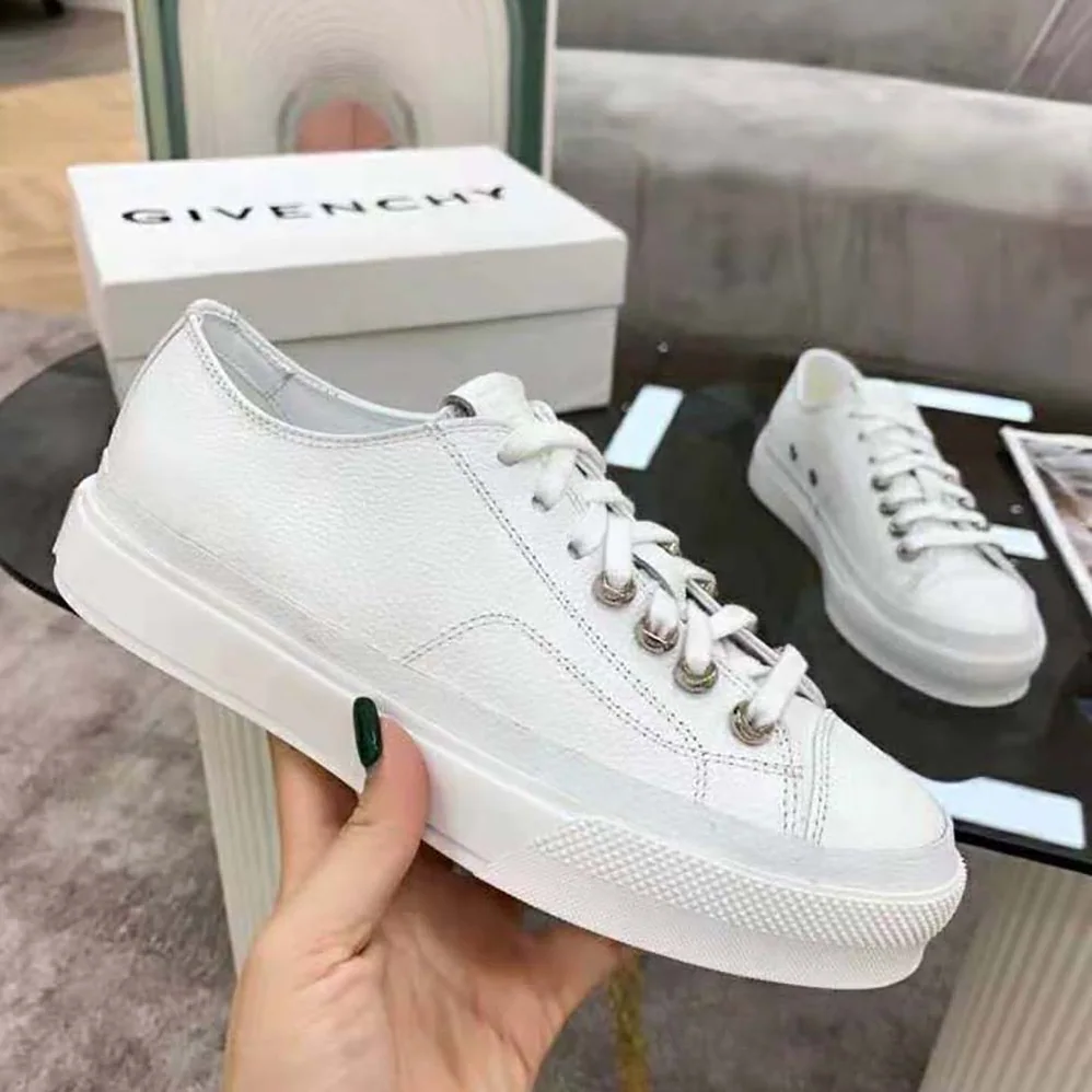 Givenchy Sneakers City in Canvas and Leather for Women in White Givenchy Sneakers City in Canvas and Leather for Women in White