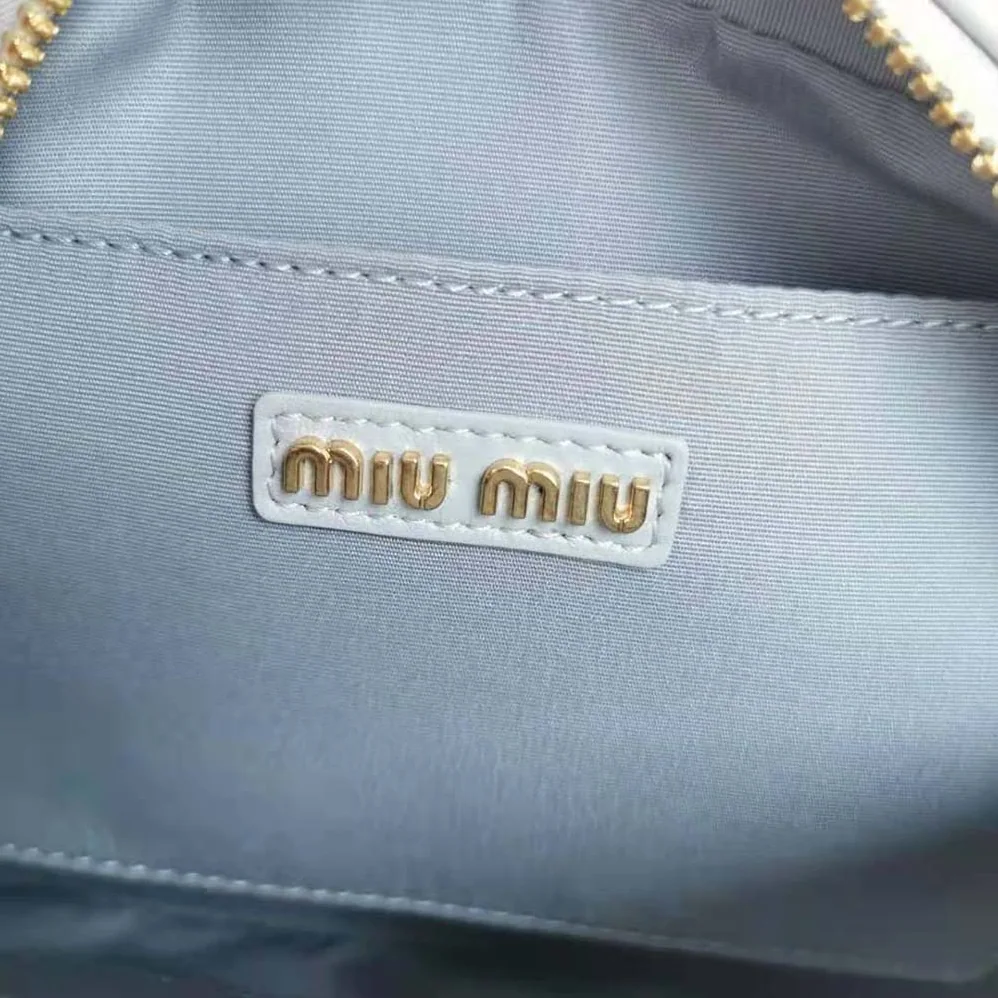 Miu Miu Matelassé Nappa Leather Top-Handle Bag for Women in Silver Miu Miu Matelassé Nappa Leather Top-Handle Bag for Women in Silver