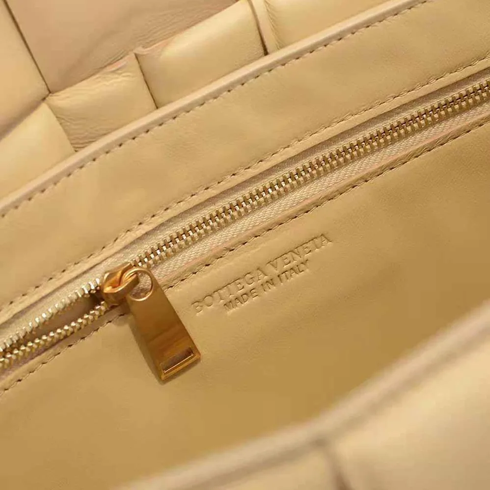 Bottega Veneta Chain Cassette Padded Intrecciato Leather Crossbody Bag for Women in Gold Bottega Veneta Chain Cassette Padded Intrecciato Leather Crossbody Bag for Women in Gold