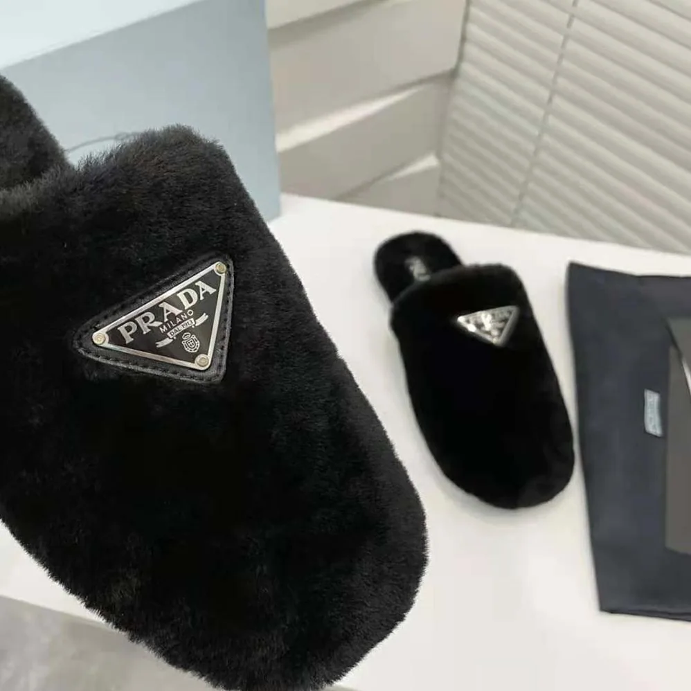 Prada Shearling Sabots The Enameled Triangle Logo for Women