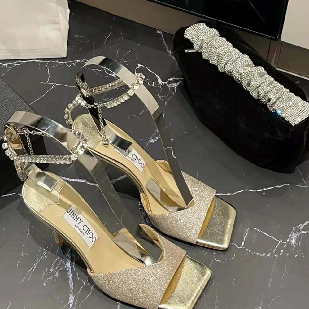 Jimmy Choo Saeda Sandal 100 Platinum Ice Dusty Glitter Sandals with Crystal Embellishment for Women Jimmy Choo Saeda Sandal 100 Platinum Ice Dusty Glitter Sandals with Crystal Embellishment for Women