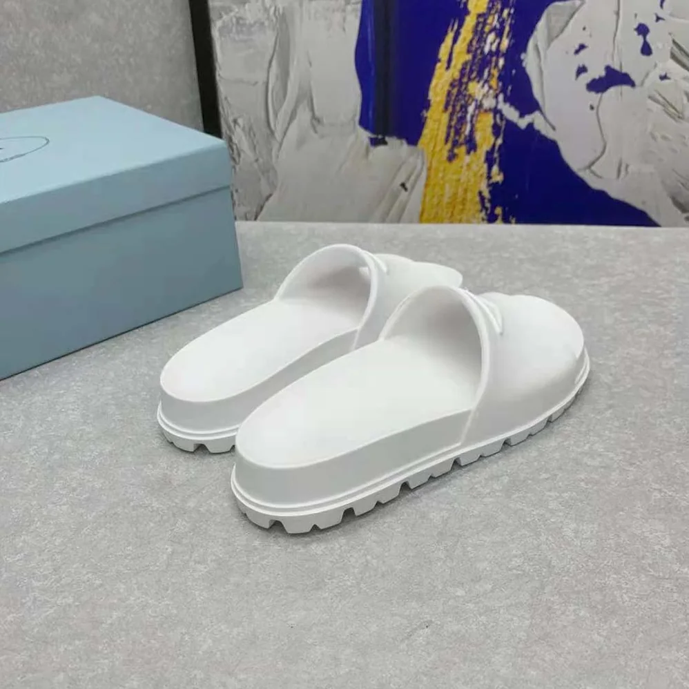 Prada Rubber Slides In 20 mm Heel Height for Women in White Prada Rubber Slides In 20 mm Heel Height for Women in White