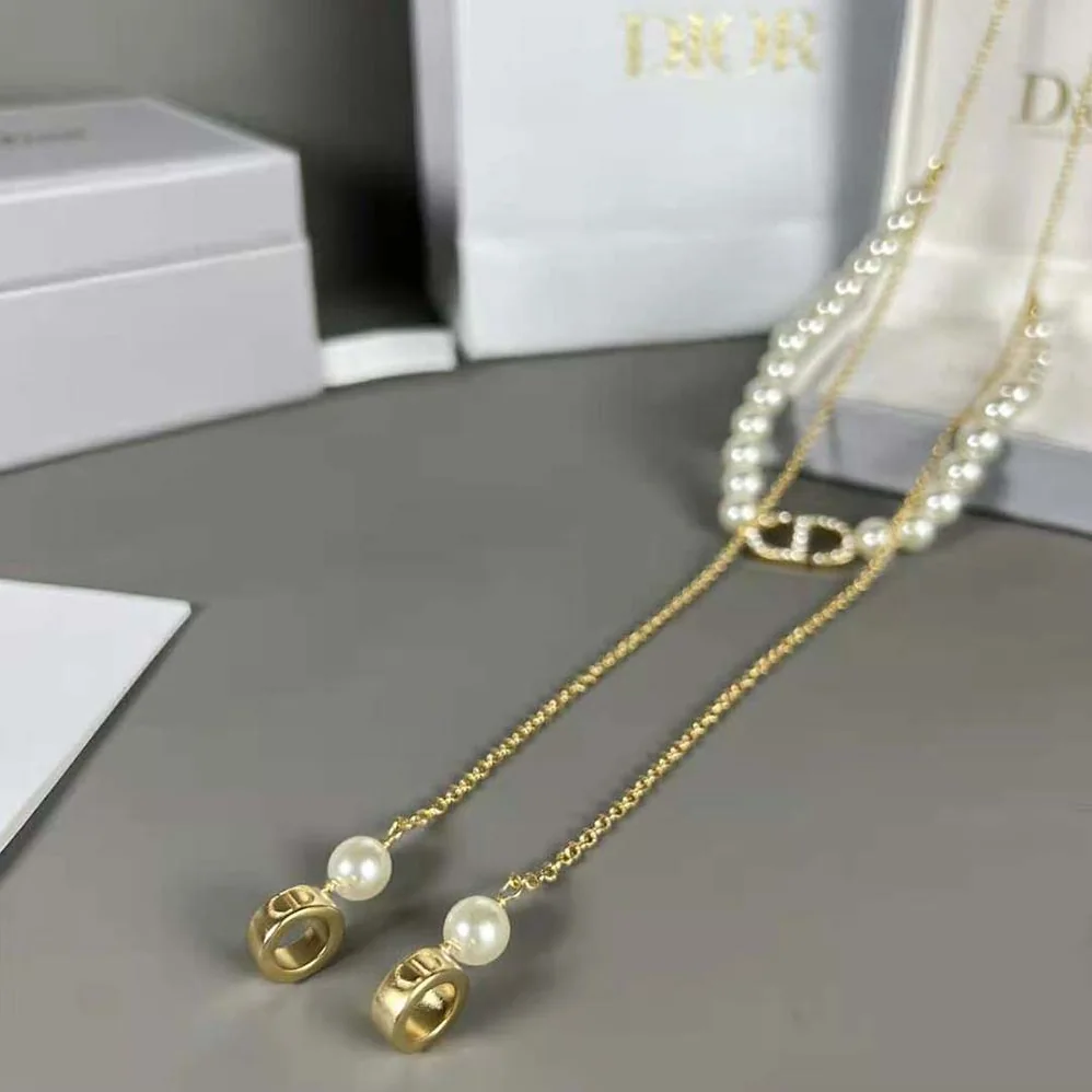 Dior Petit CD Necklace for Headphones Gold for Women in Finish Metal Dior Petit CD Necklace for Headphones Gold for Women in Finish Metal