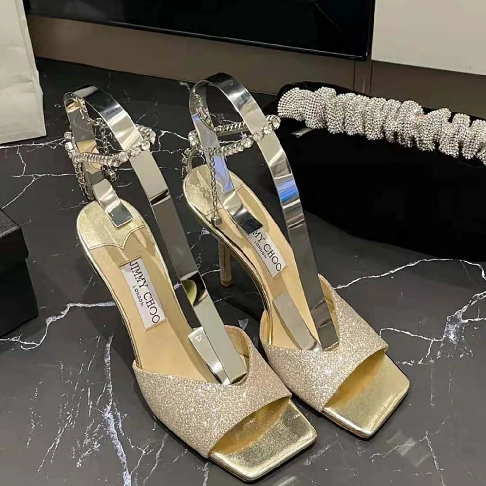 Jimmy Choo Saeda Sandal 100 Platinum Ice Dusty Glitter Sandals with Crystal Embellishment for Women Jimmy Choo Saeda Sandal 100 Platinum Ice Dusty Glitter Sandals with Crystal Embellishment for Women