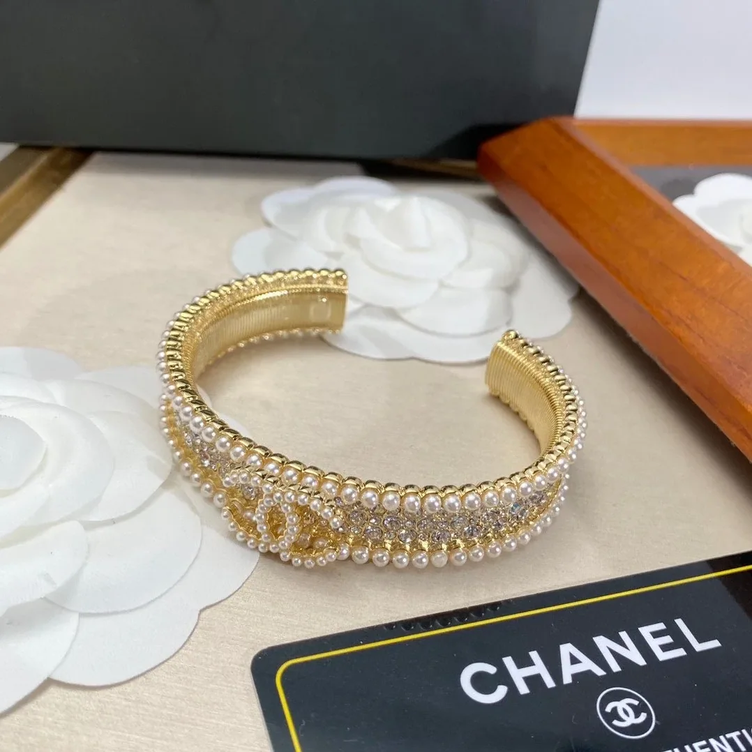 Chanel Pearl And Crystal Interlocking CC Cuff Bracelet Gold Hardware Chanel Pearl And Crystal Interlocking CC Cuff Bracelet Gold Hardware