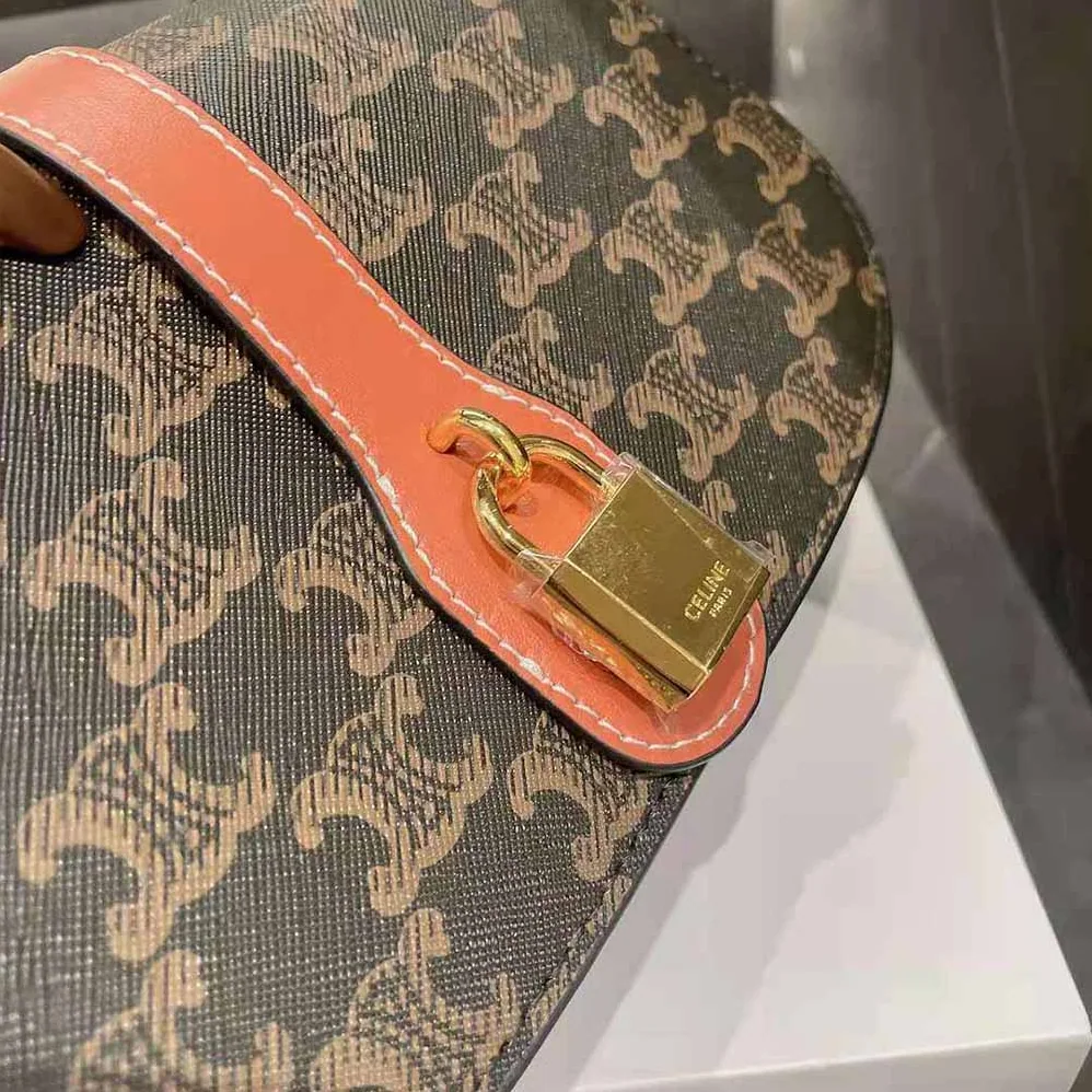 Celine Clutch on Strap in Triomphe Canvas and Calfskin for Women
