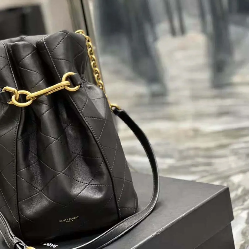 Saint Laurent YSL Le Maillon Hook Bucket Bag in Supple Leather for Women in Black Saint Laurent YSL Le Maillon Hook Bucket Bag in Supple Leather for Women in Black