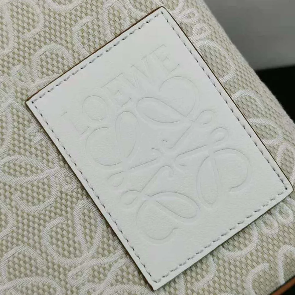 Loewe Oblong Anagram Pouch in Jacquard and Calfskin for Women in White Loewe Oblong Anagram Pouch in Jacquard and Calfskin for Women in White
