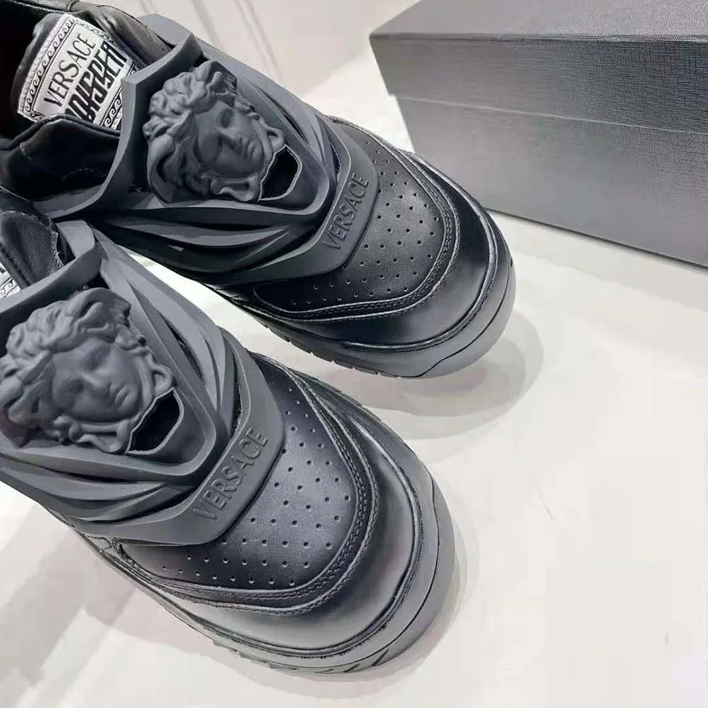 Versace Odissea Sneakers are Set on Rubber Soles with Perforated Toe Caps for Unisex in Black Versace Odissea Sneakers are Set on Rubber Soles with Perforated Toe Caps for Unisex in Black