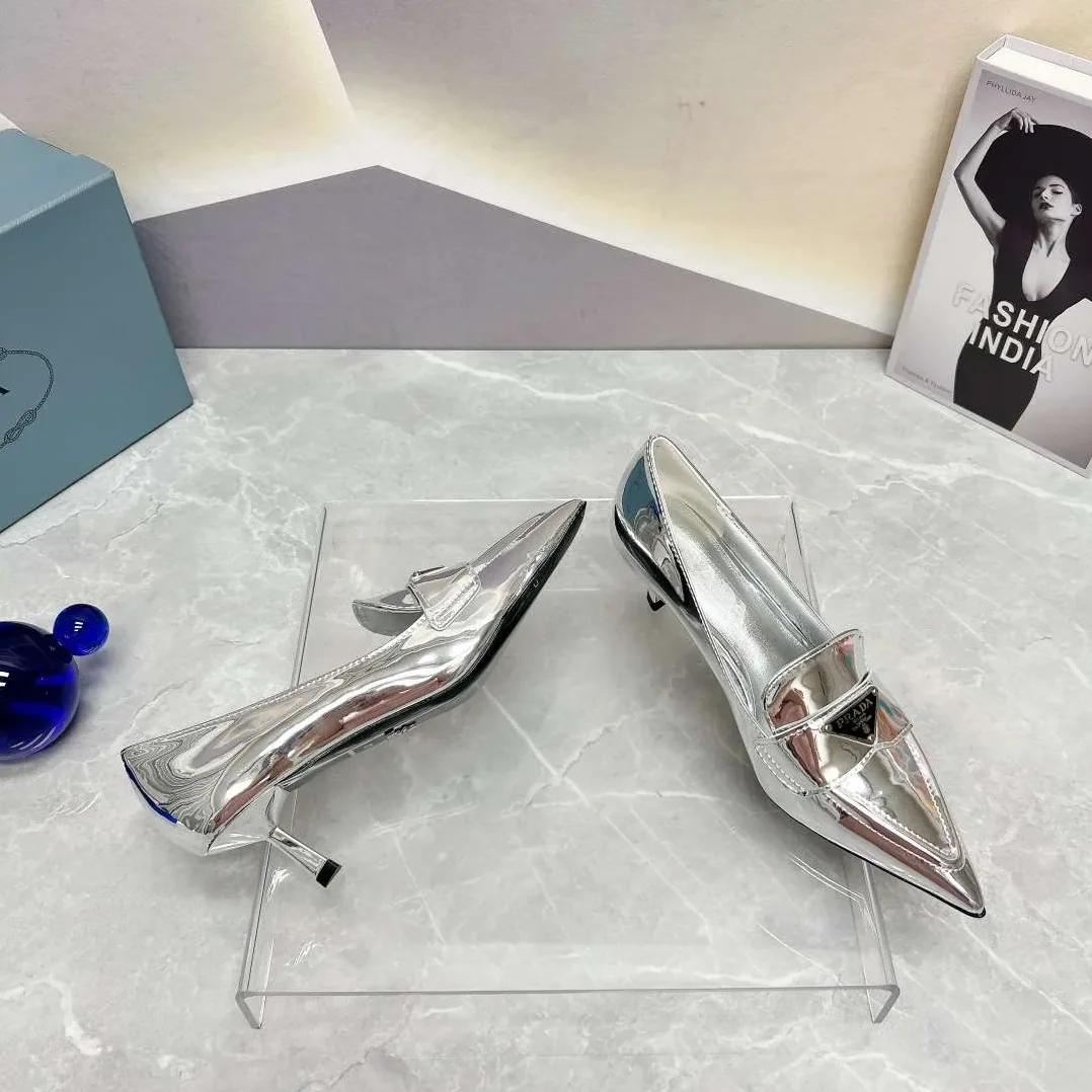 Prada Patent Pumps Silver