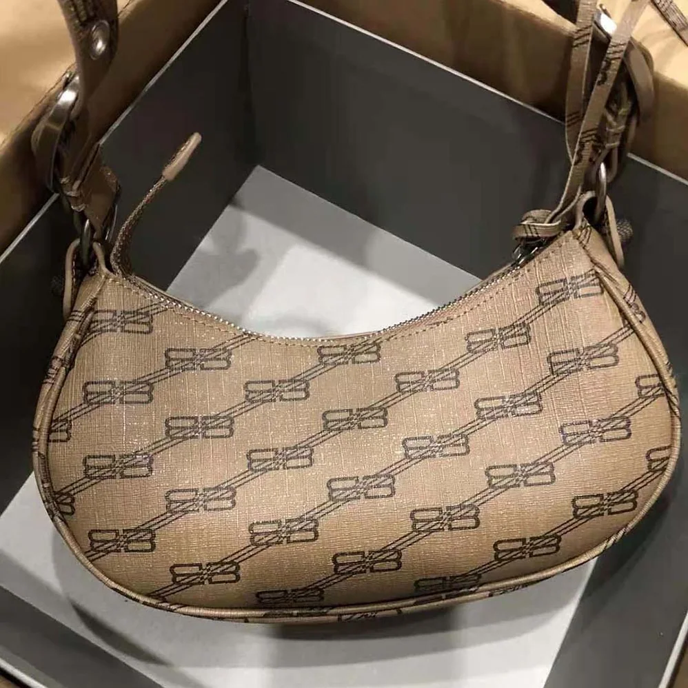 Balenciaga Le Cagole Mini Bag with Chain BB Monogram Coated Canvas in Beige for Women