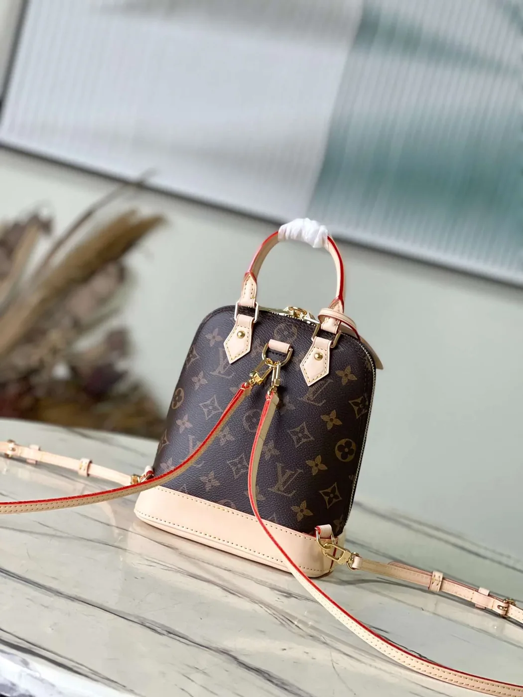Louis Vuitton Alma Top Handle Bag in Brown Gold Hardware Louis Vuitton Alma Top Handle Bag in Brown Gold Hardware