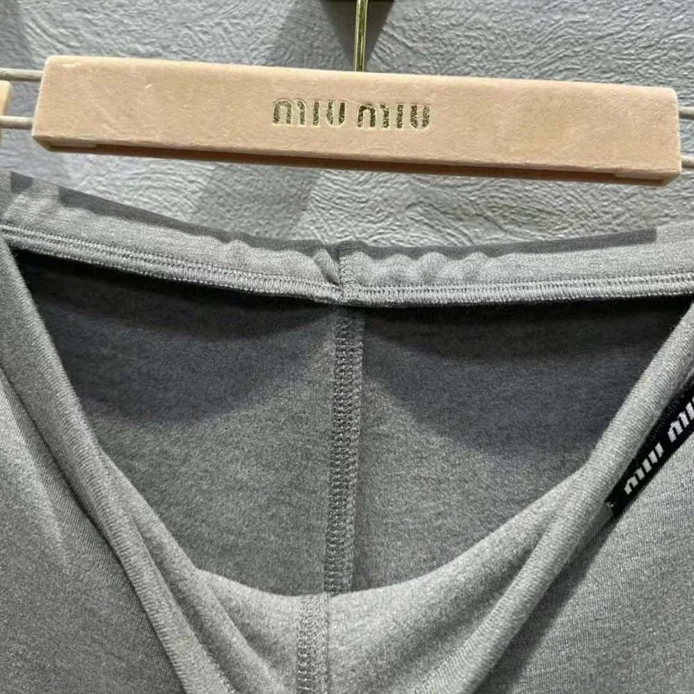 Miu Miu Silk Jersey Pants with Logo Patch for Women in Gray