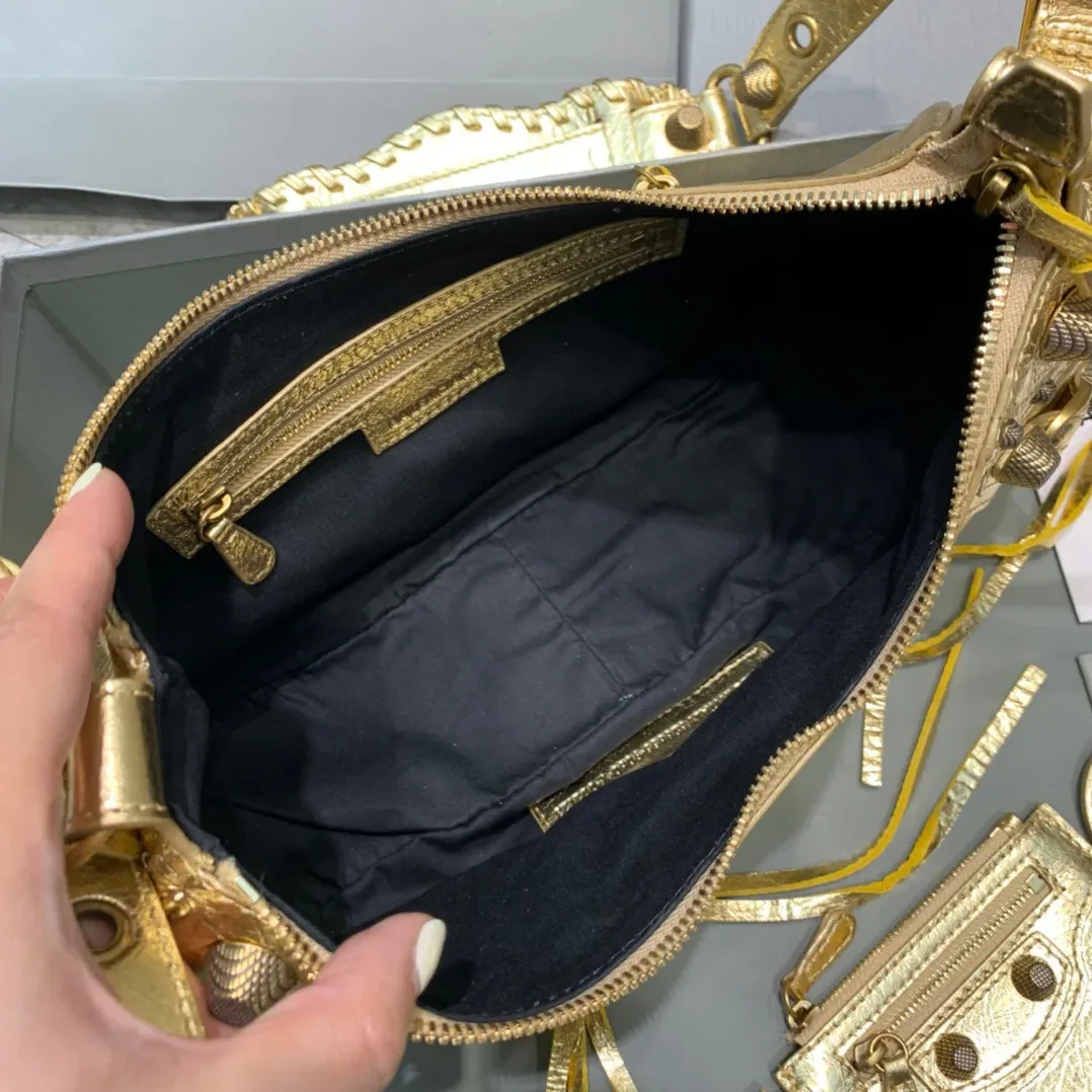 Balenciaga Le Cagole XS Shoulder Bag In Gold