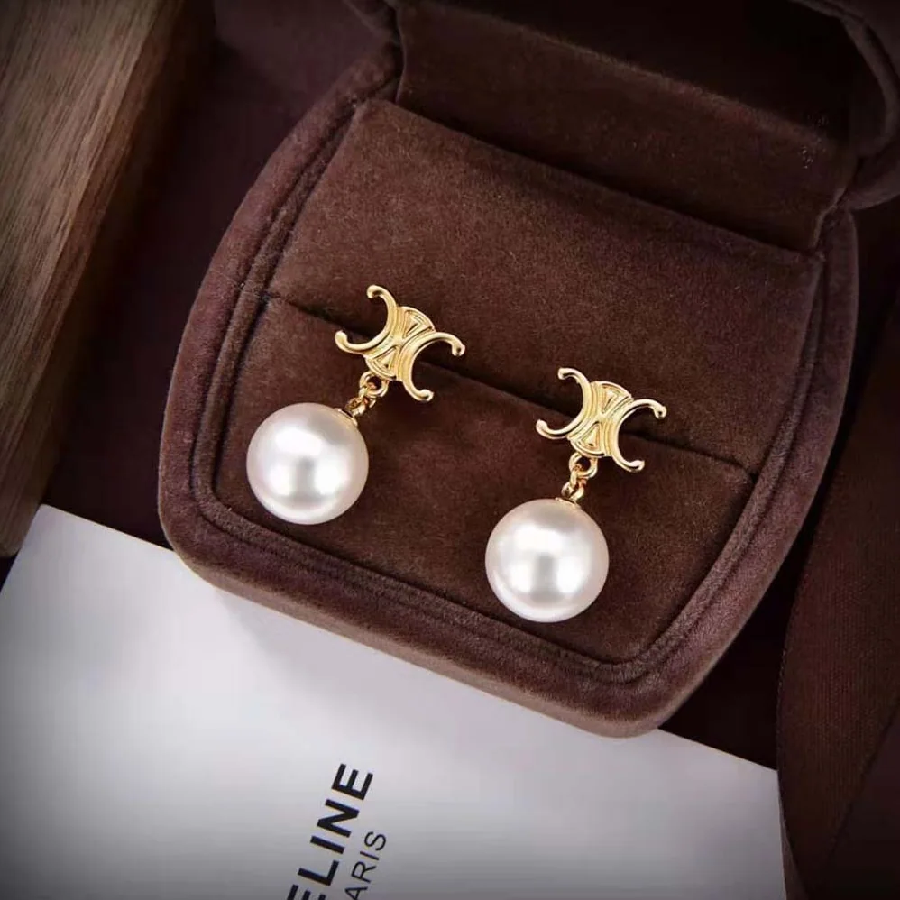 Celine Triomphe Pearl Earrings in Brass with Gold Finish and Glass Pearls for Women