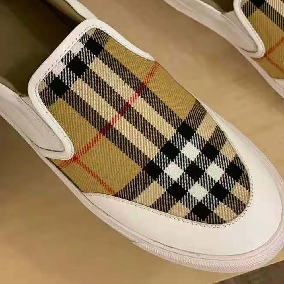 Burberry Leather and Vintage Check Slip-on Sneakers for Women in White Burberry Leather and Vintage Check Slip-on Sneakers for Women in White