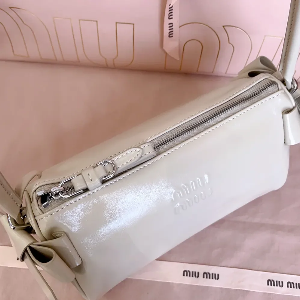Miu Miu Shiny Leather Pouch for Women in Pink Miu Miu Shiny Leather Pouch for Women in Pink