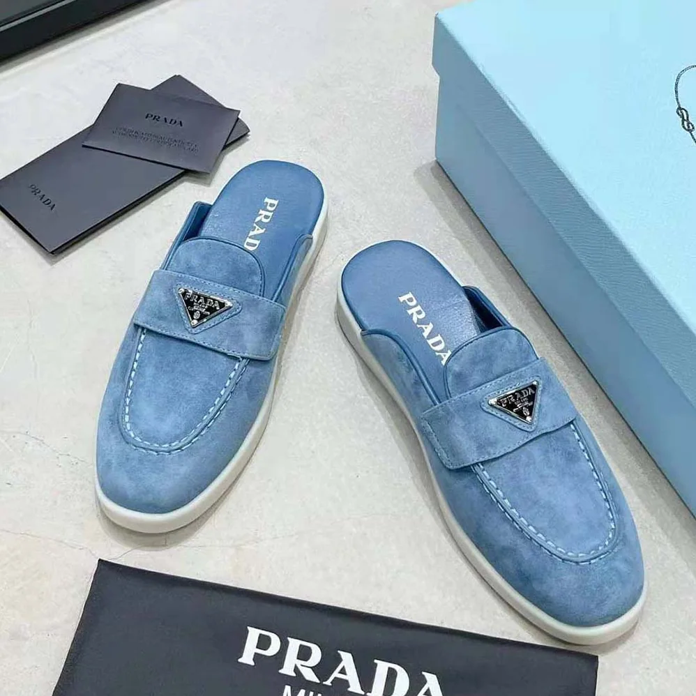 Prada Suede Sabots with the Enameled Metal Triangle Logo for Men
