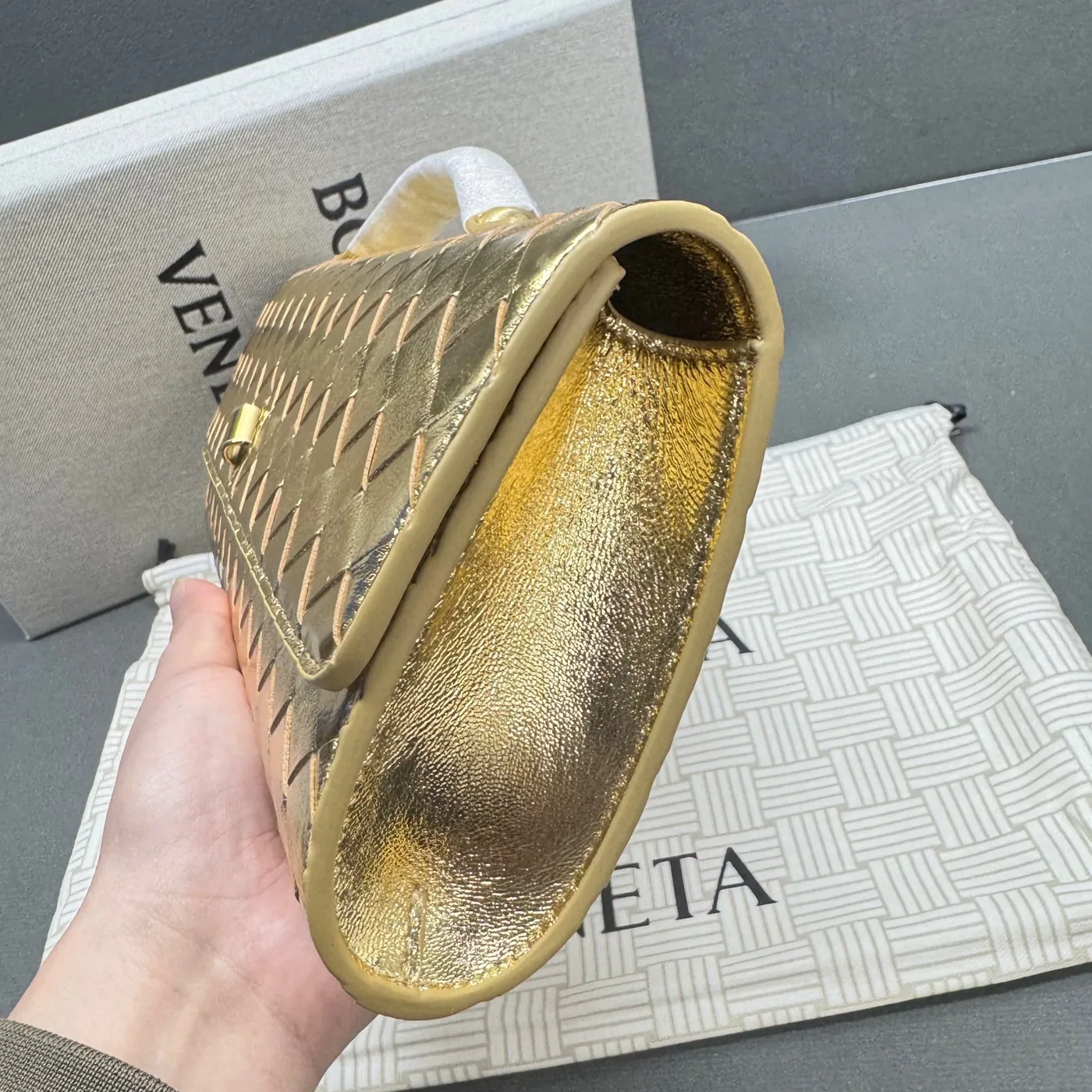 Bottega Veneta Andiamo Clutch in Gold Metallic Gold Hardware