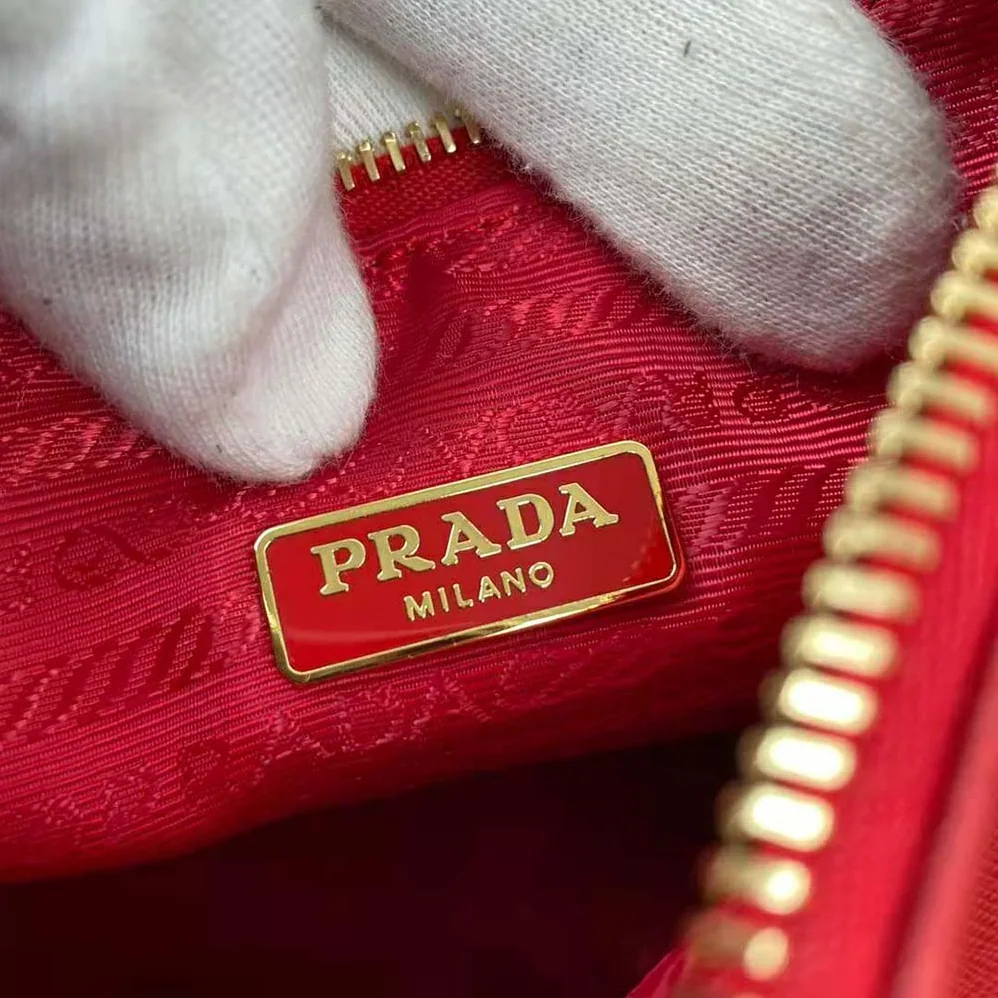 Prada Prada Re-Edition 2005 Saffiano Leather Bag for Women in Red