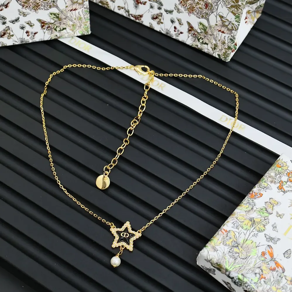 Dior Petit CD Lucky Baroque Necklace Gold-Finish Metal with White Resin Pearls and Deep Ocean Blue Glass for Women Dior Petit CD Lucky Baroque Necklace Gold-Finish Metal with White Resin Pearls and Deep Ocean Blue Glass for Women