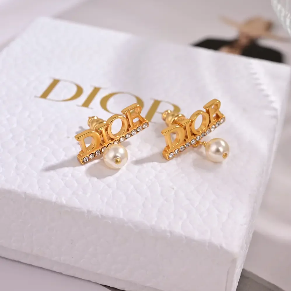 Dior Dio(r)evolution Earrings Gold-Finish Metal with White Resin Pearls and Silver for Women in Tone Crystals Dior Dio(r)evolution Earrings Gold-Finish Metal with White Resin Pearls and Silver for Women in Tone Crystals