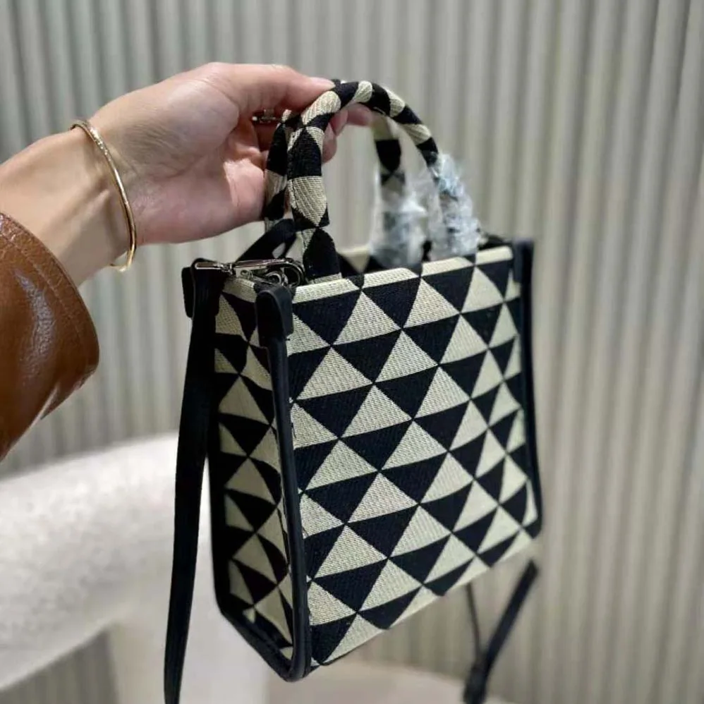 Prada Symbole Jacquard Fabric Micro Bag for Women in Black Prada Symbole Jacquard Fabric Micro Bag for Women in Black