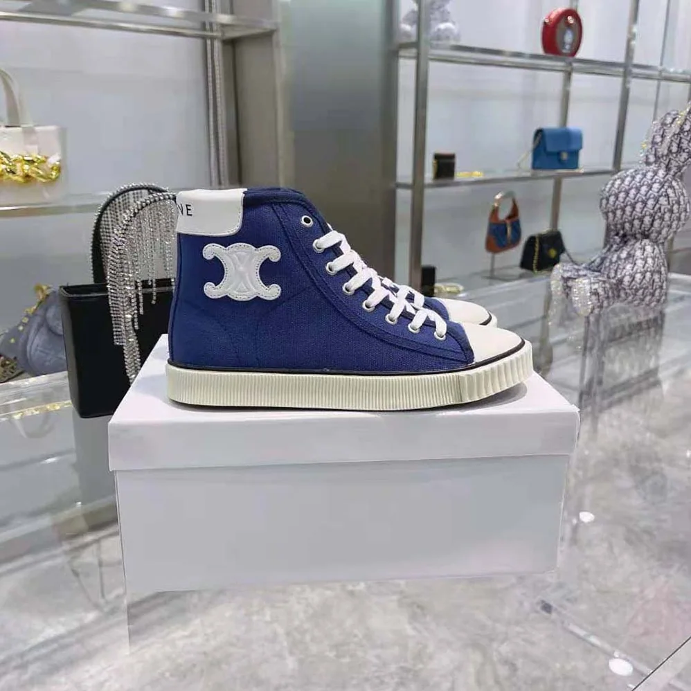 Celine Blank Mid Lace up Sneaker with Toe Cap in Canvas and Calfskin for Women Celine Blank Mid Lace up Sneaker with Toe Cap in Canvas and Calfskin for Women