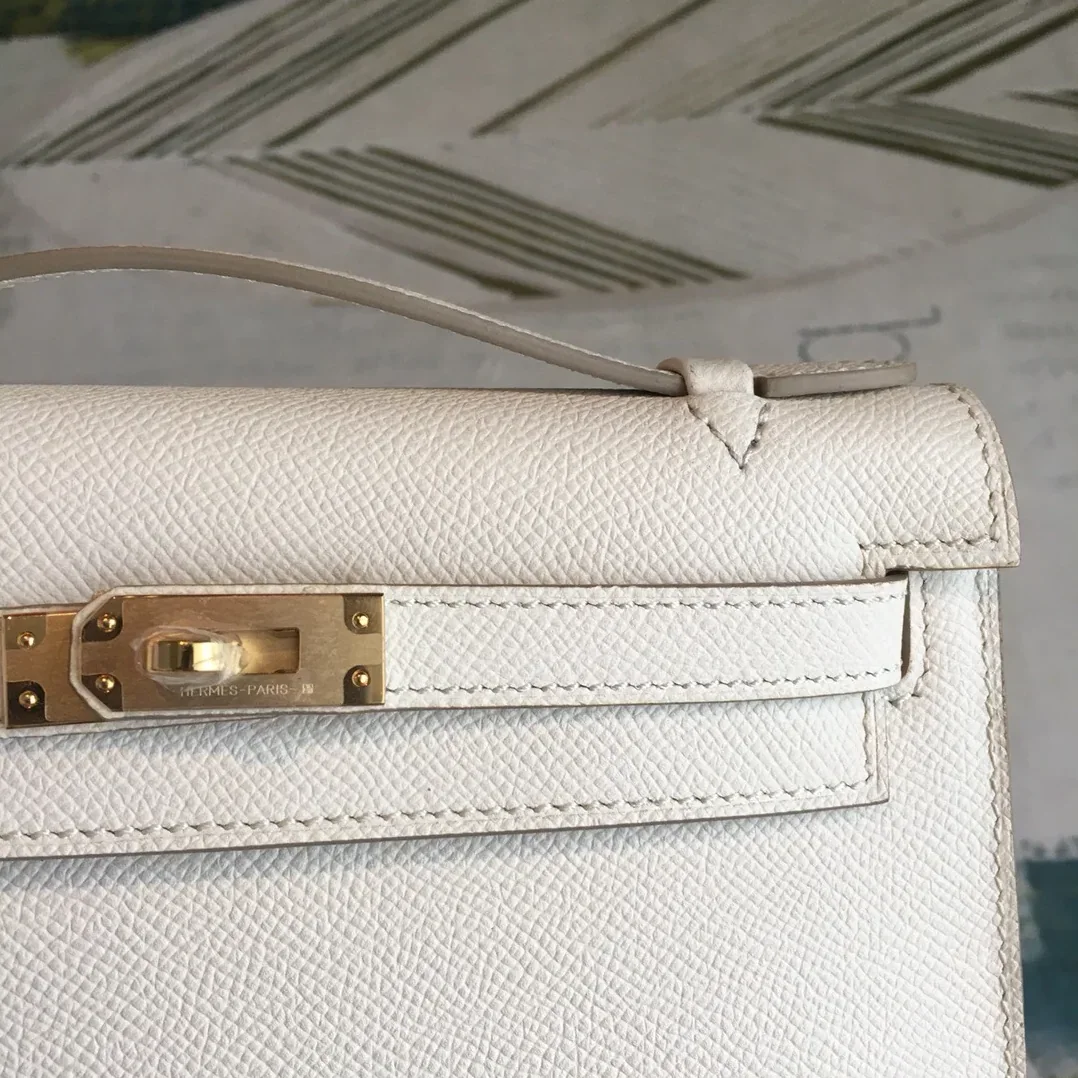 Hermes Kelly Pochettee White Gold Toned Hardware /