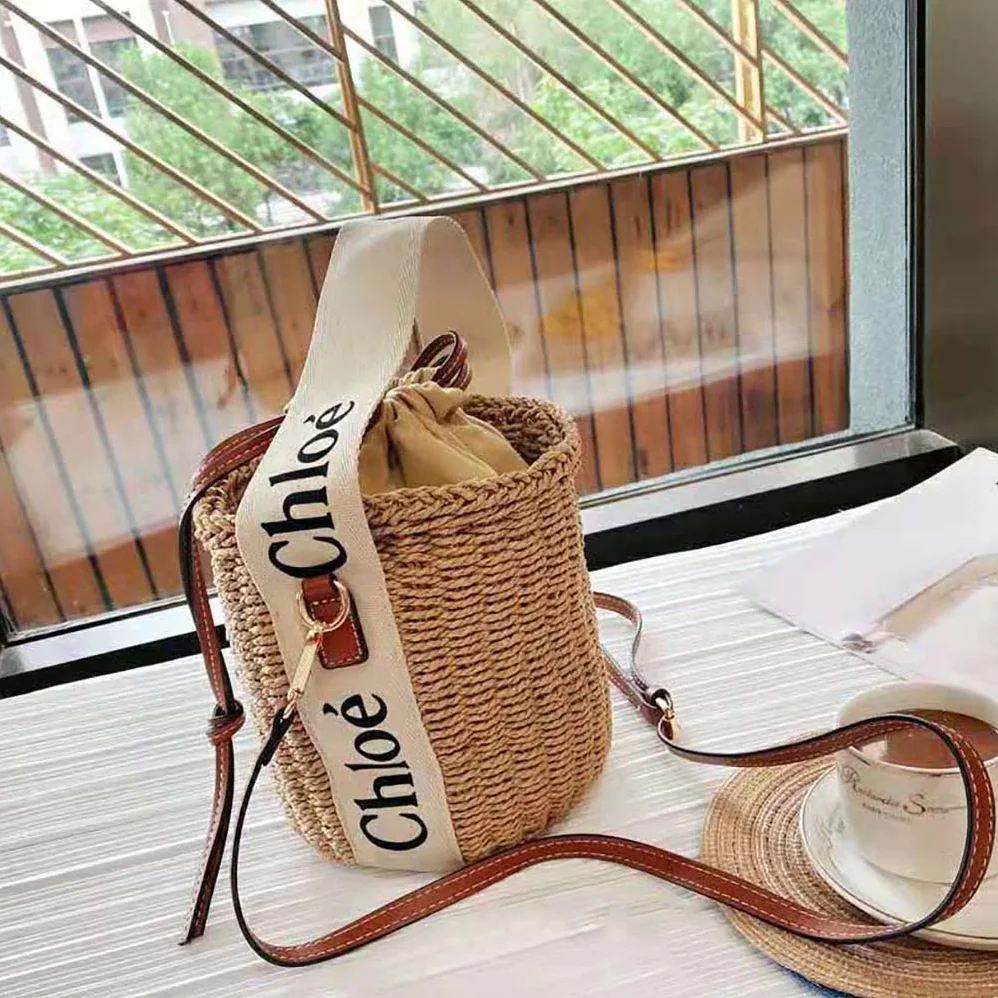 Chloe Small Woody Basket in Fair-trade Paper with the Woody Ribbon for Women Chloe Small Woody Basket in Fair-trade Paper with the Woody Ribbon for Women
