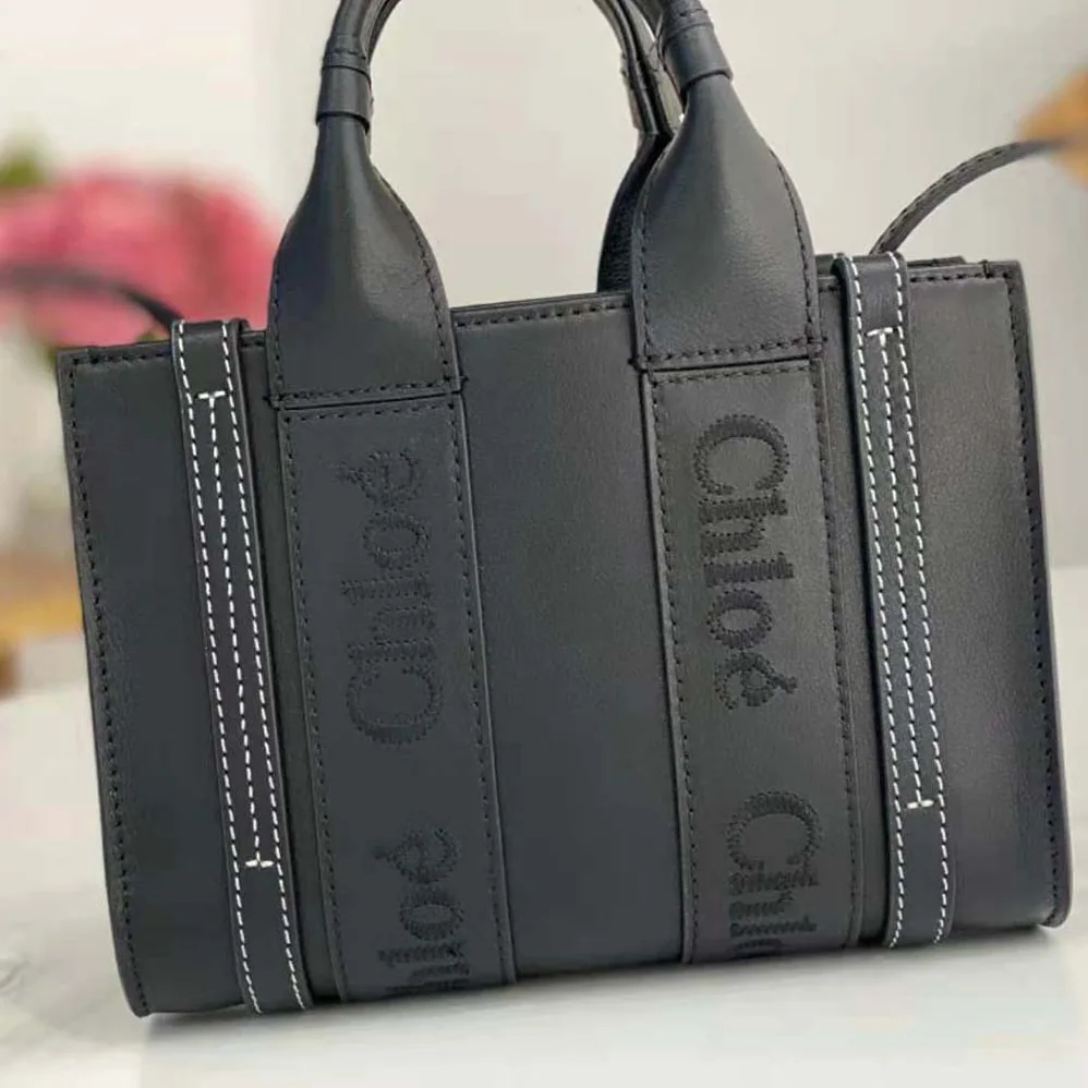 Chloe Mini Woody Tote Bag with Embroidered Chloé Logo for Women in Black Chloe Mini Woody Tote Bag with Embroidered Chloé Logo for Women in Black