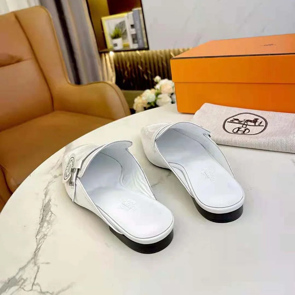 Hermes Groupie Mule in Goatskin with Miniature Palladium-Plated Paris Buckle for Women in White