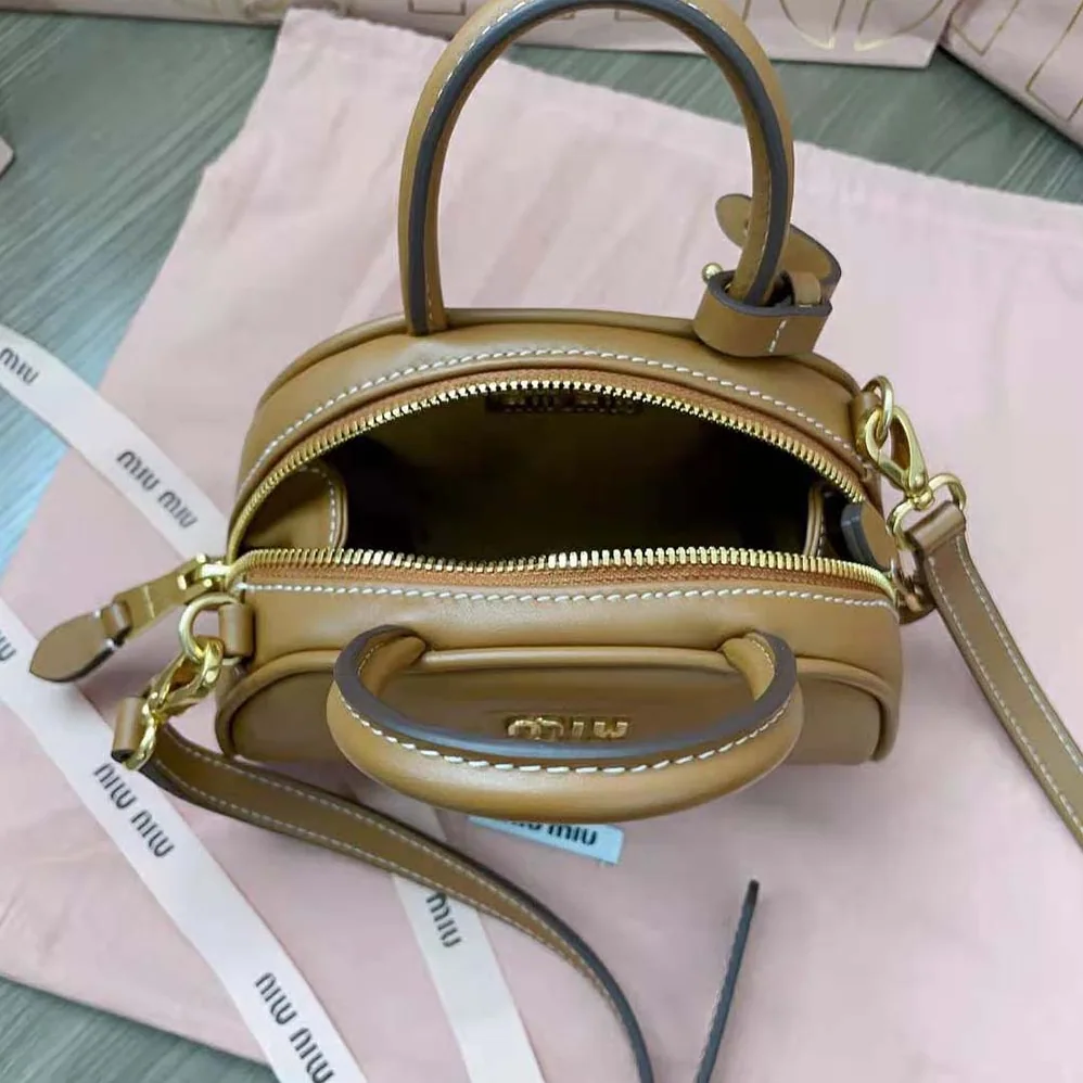 Miu Miu Mini Leather Top-handle Bag for Women in Brown