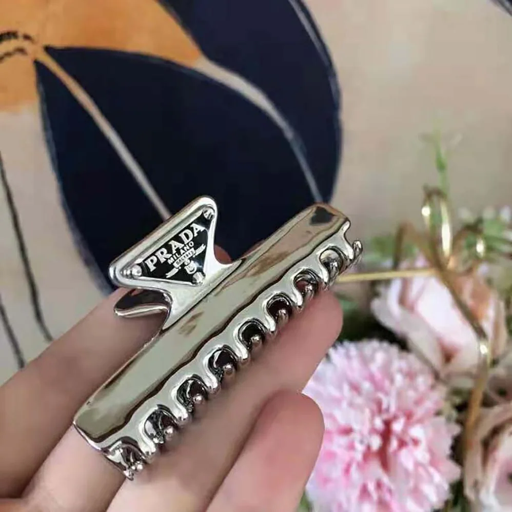 Prada Metal Hair Clip with Sophisticated and Versatile Allure for Women Prada Metal Hair Clip with Sophisticated and Versatile Allure for Women