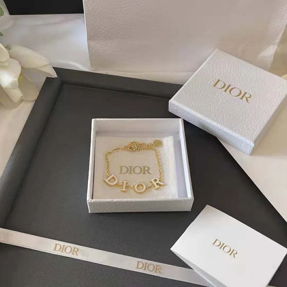 Dior Dio(r)evolution Bracelet Gold-Finish Metal and White Lacquer for Women Dior Dio(r)evolution Bracelet Gold-Finish Metal and White Lacquer for Women