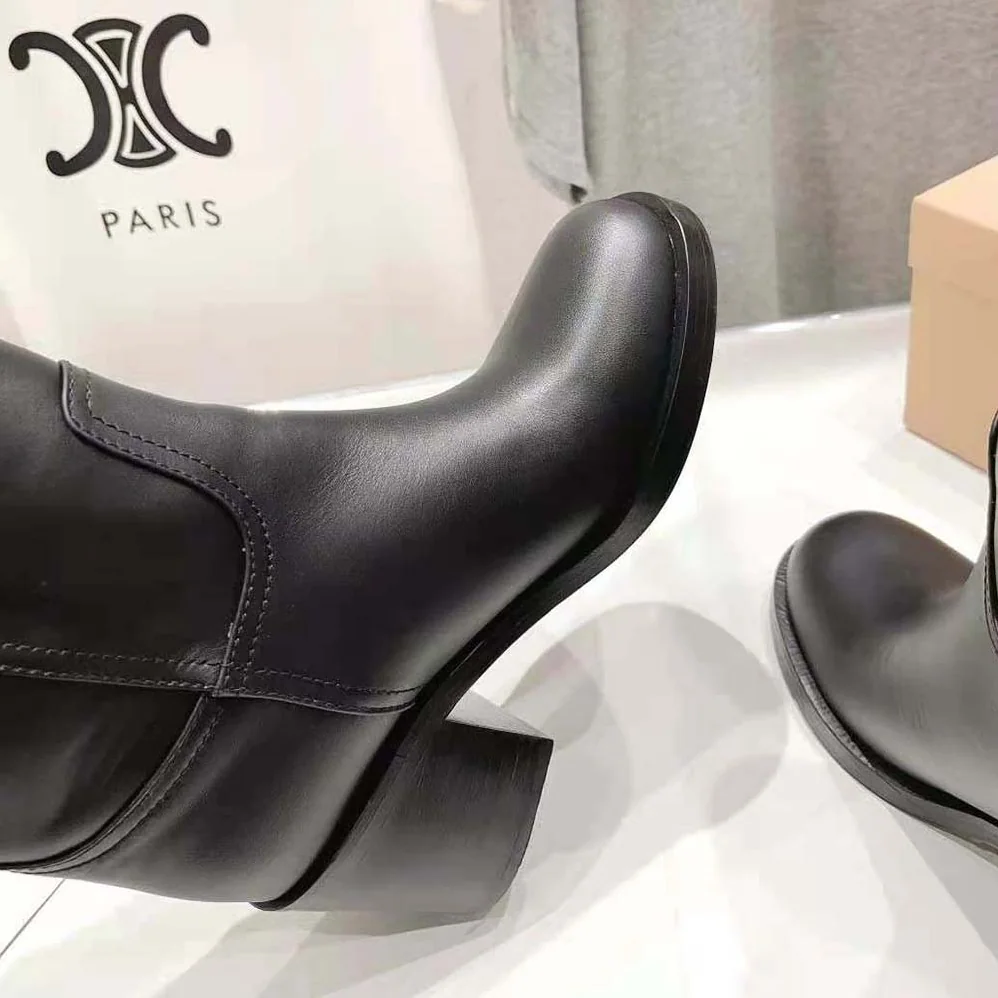 Miu Miu Leather Booties with Hot-stamped Logo for Women in Black