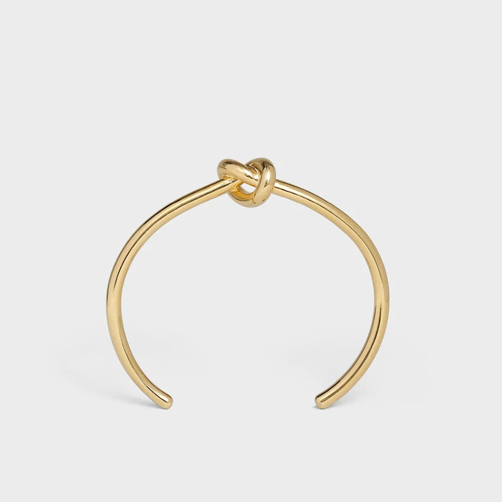 Celine Knot Extra-Thin Bracelet in Brass with Rhodium Finish for Women in Gold