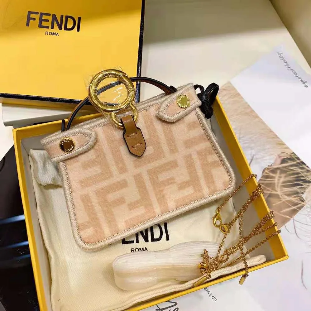 Fendi Nano Peekaboo Charm Beige Wool Charm for Women in Pink Fendi Nano Peekaboo Charm Beige Wool Charm for Women in Pink